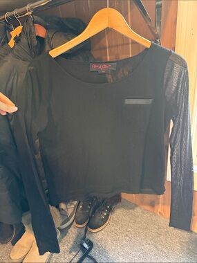 Alice and Olivia black sheer top with leather detail on front pocket, size xs